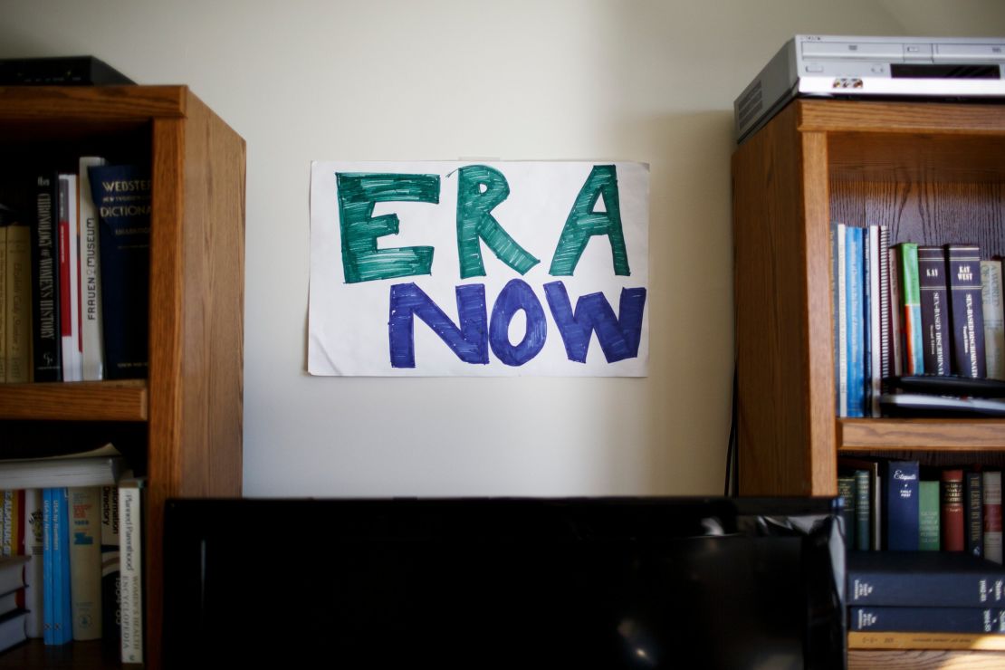 The offices of the Feminist Majority Foundation pay homage to an ongoing battle to secure equal rights for women. Amid framed posters gathered over the years are handmade signs like this one. 