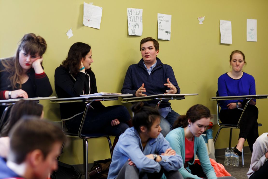 James Barringer, center, started Boys and Men for the ERA and is part of his school's feminism club. 
