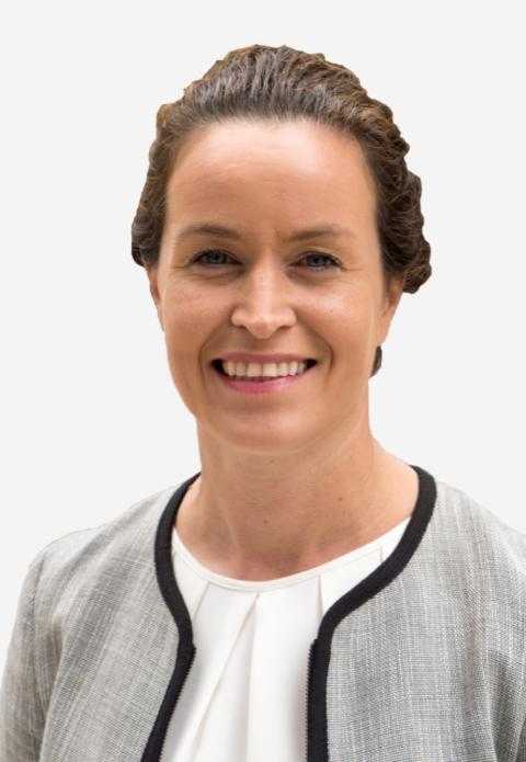 Woman in grey jacket.